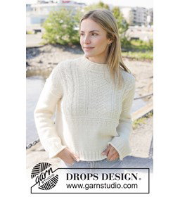 korte oversized damestrui met kabels gemaakt van Breinaalden zonder knop