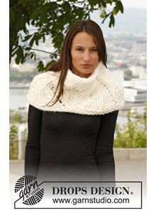 Gebreide schouderwarmer met kantpatroon van Polaris.