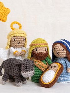 Kerststal met Jozef, Maria, Jezus, Gabriel en ezel