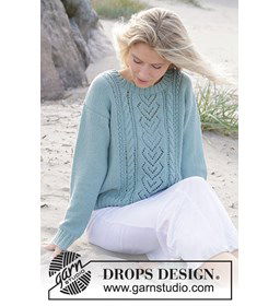 Damestrui met kabel- en ajourpatroon gemaakt van Drops Merino extra fine