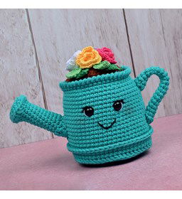 Gieter gevuld met bloemen gemaakt van Durable Coral