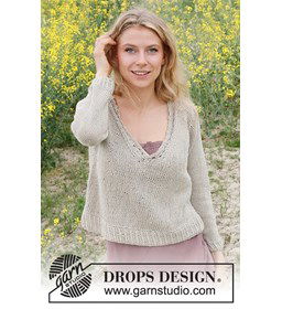 Korte damestrui met lage V-hals. gemaakt van Drops Bomull lin