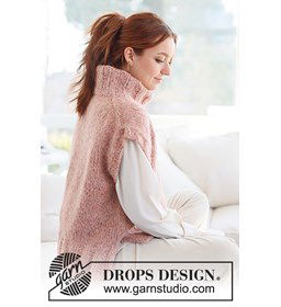 Mouwloze damestrui met splitten in de zijnaad gemaakt van Drops Brushed Alpaca Silk