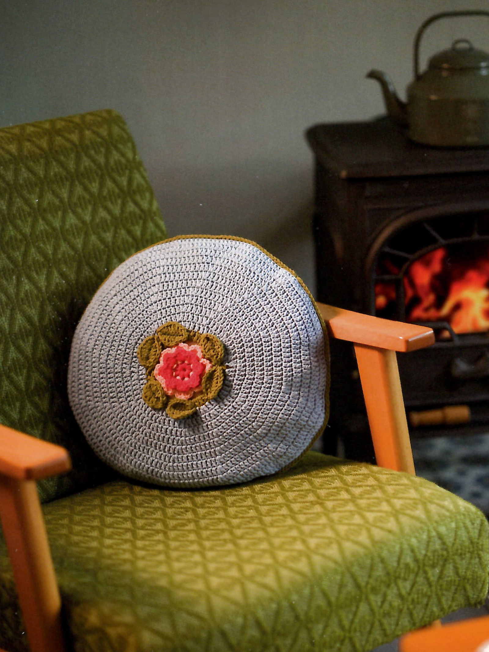 Rond kussen met bloem