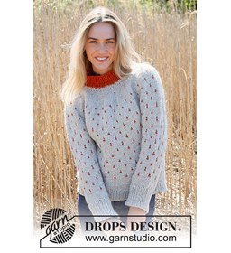 Damestrui met veelkleurig patroon gemaakt van Drops Andes