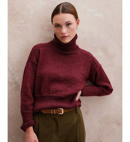 Damestrui met hoge dubbele col gemaakt van Breinaalden