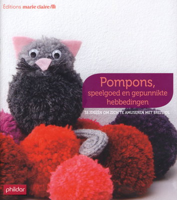 Pompons speelgoed en gepunnikte hebbedingen