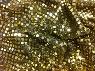 Stof met rondjes 550 goud 1 meter op=op 