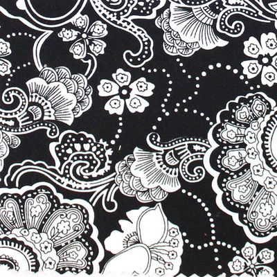 Tissu de Marie bloemen wit op zwarte achtergrond per 50 cm 